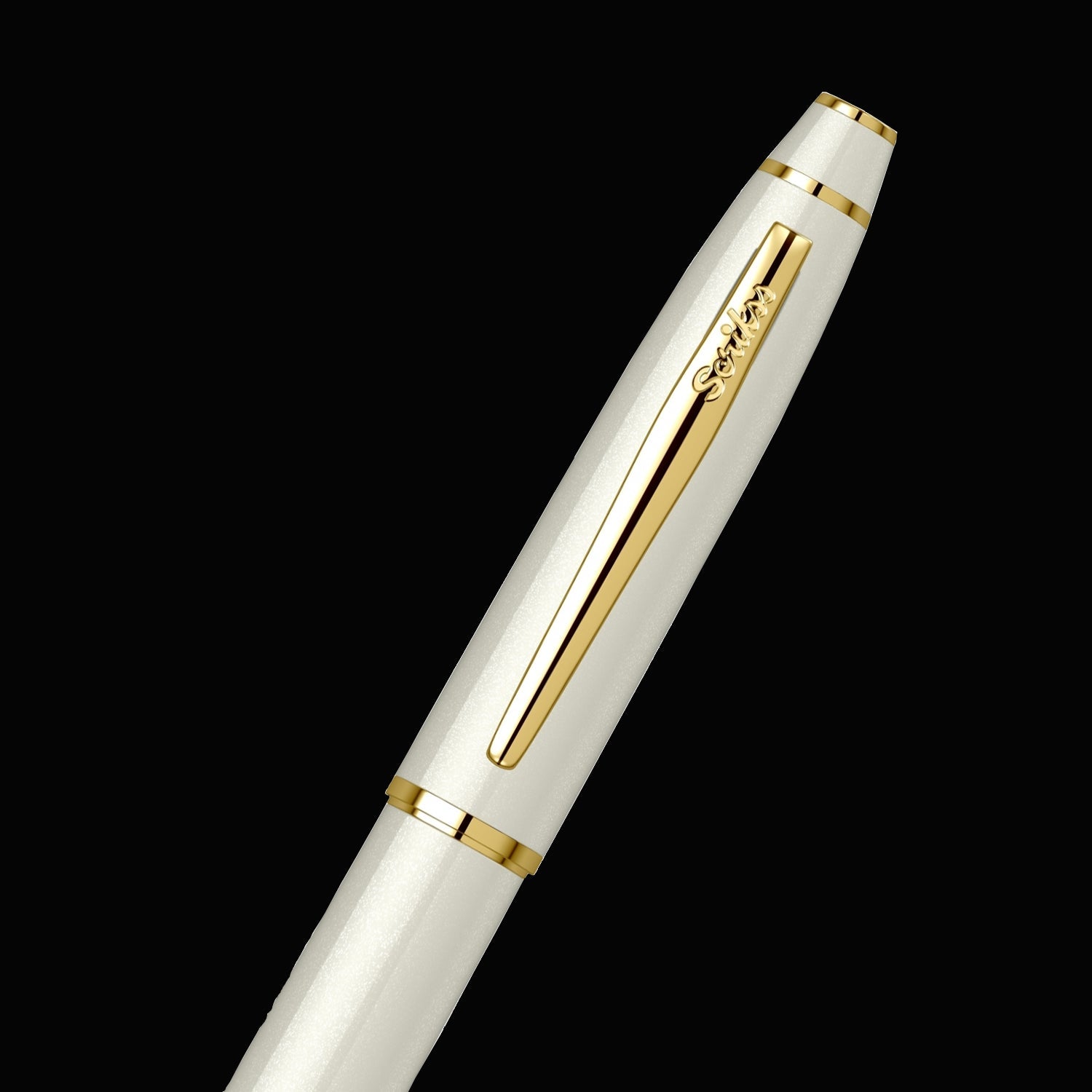 Scrikss Noble 35 Medium nib Fountain Pen - Ivory GT on a black background