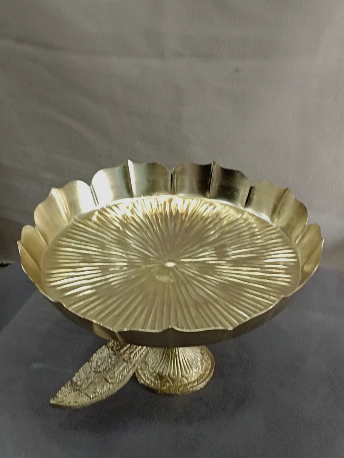 Gold Lotus Urli Bowl on Peacock Stand – Festive Decor
