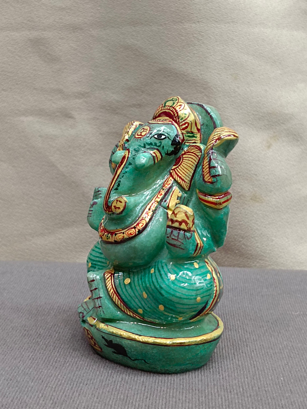 Hand-Painted Stone Ganesh Idol – Green & Gold