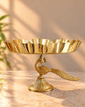 Gold Lotus Urli Bowl on Peacock Stand – Festive Decor