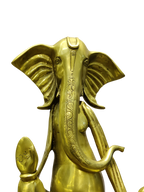 Golden Seated Lord Ganesha Idol – Minimalist Brass Divine Elegance