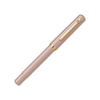Scrikss 419 Medium Nib Powder GT fountain pen with gold accents on a white background