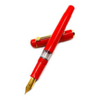 Scrikss 419 Medium Nib Fountain Pen in Red GT on a white background