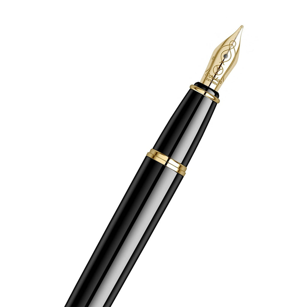 scrikss honour 38 medium nib glossy Black fountain pen with gold accents on a white background