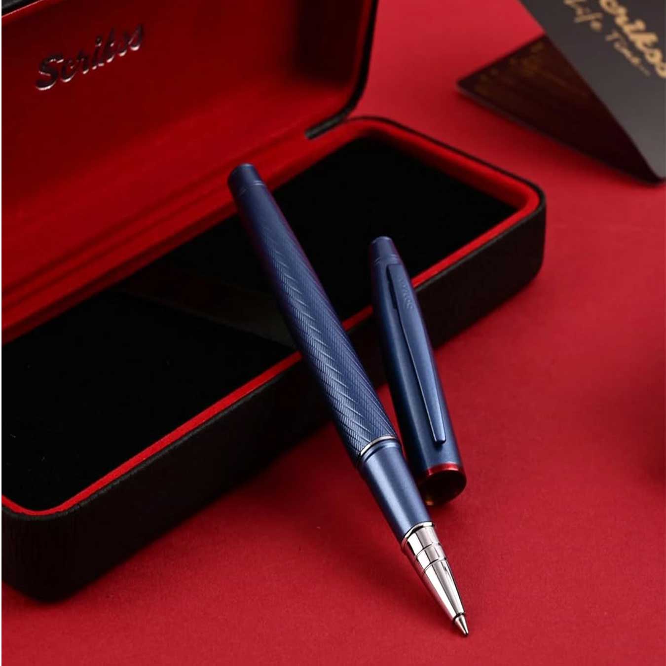 Scrikss Noble 35 Rollerball Pen in Blue on a red and black box