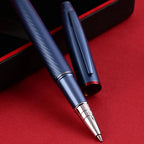Scrikss Noble 35 Rollerball Pen - Blue on a red surface