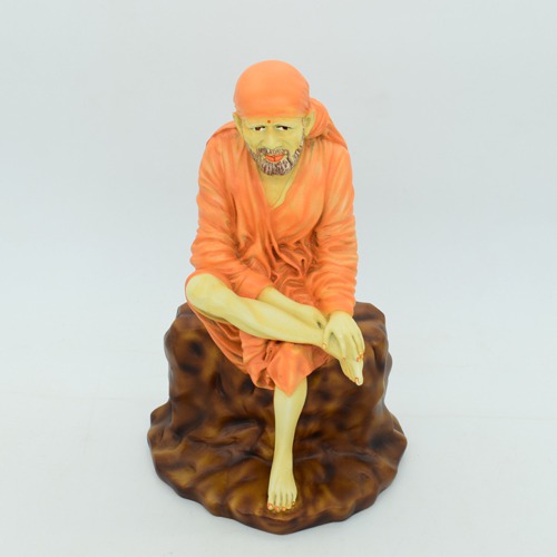 Sai Baba Murti | Lord Sai Baba Idol Sitting On Stone Antique showpiece, Made of Fiber for car dasboard