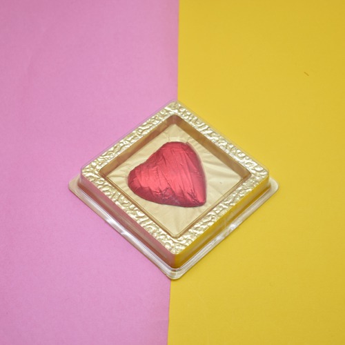 Heart Shape Chocolate Wrapped In Red  Foil Paper