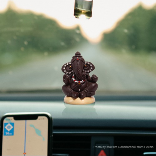 Small Brown Decorative Sitting Ganesha Idol For Car Dashboard