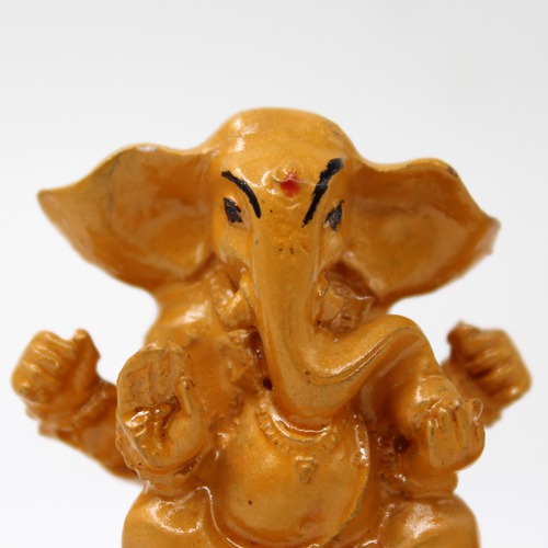 Yellow Lord Ganesh Sitting on the Hand Statue For Home & Office Decor