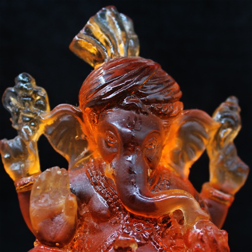 Orange Polyresin Maharaj Ganesh Idol For Card Dashboard