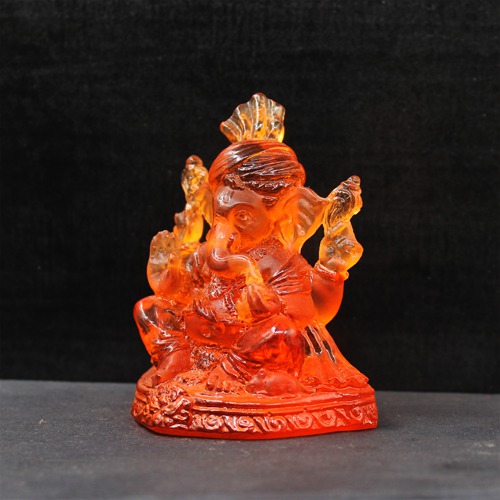 Orange Polyresin Maharaj Ganesh Idol For Card Dashboard