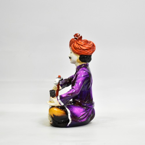 Purple and Yellow Rajasthani Men Working With hammer Decorative Showpiece
